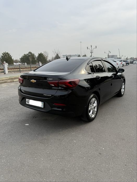 Onix Premier 2 turbo AT plus