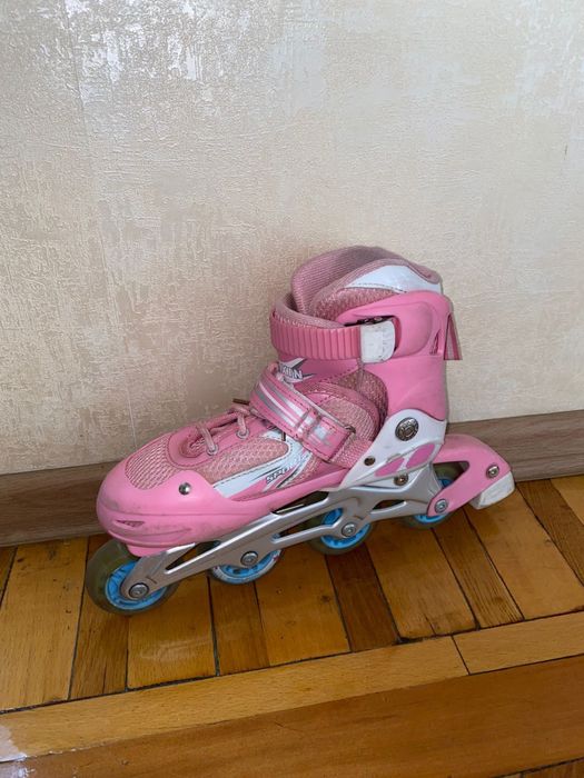 Роликовые коньки