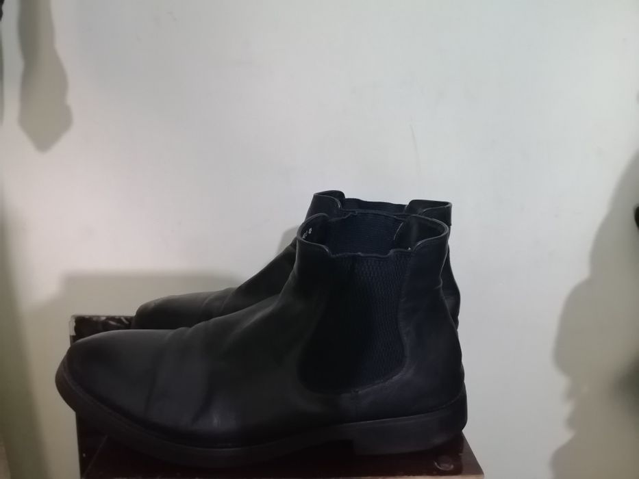 Продам фирменные сапоги.