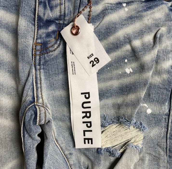 Purple ripped jeans