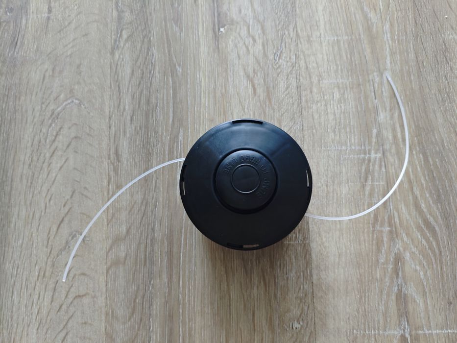 Катушка для триммера с леской.