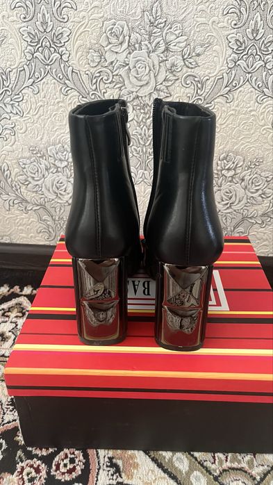 Продам осенние сапоги