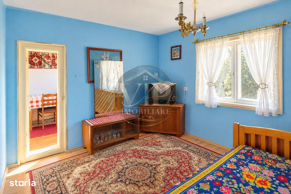 Casa individuala cu 4 camere,1130 mp teren,Intregalde