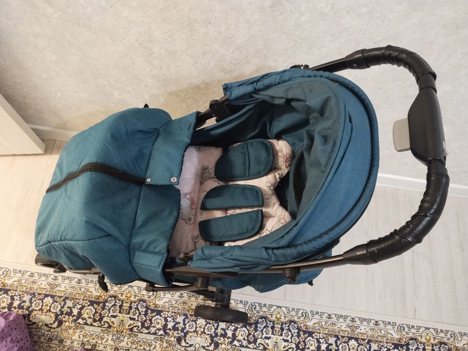 Бала сүйрететін арба. Коляска детский