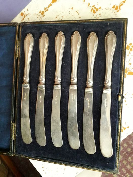 Vechi set cutite din argint