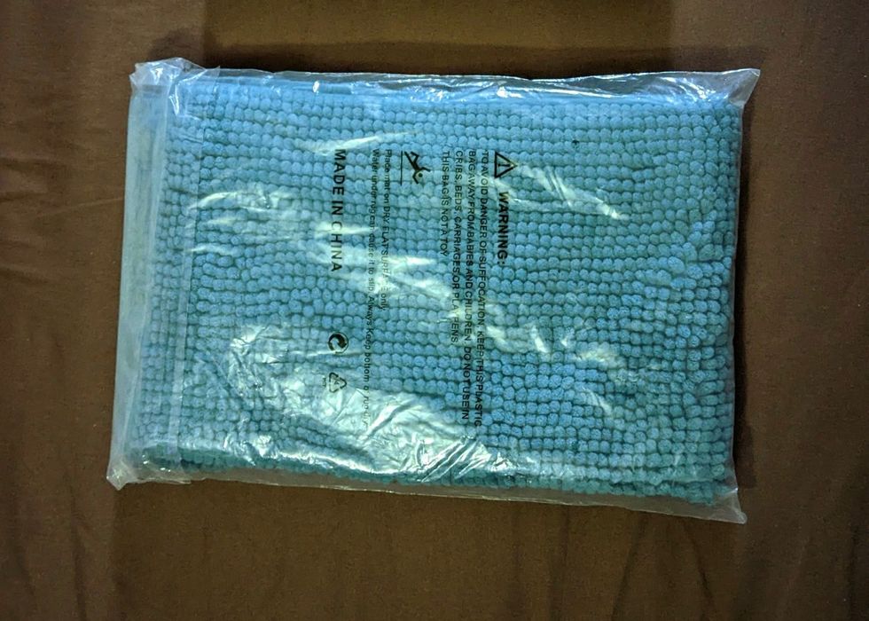 Новый в упаковке коврик микрофибра 50х80