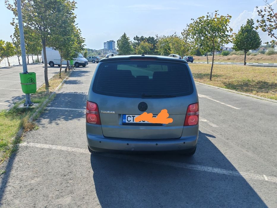 Volkswagen Touran 1.6 benzina și gpl 1250 e.