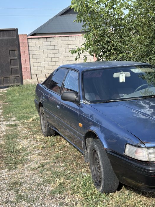 Мазда 626 синий.