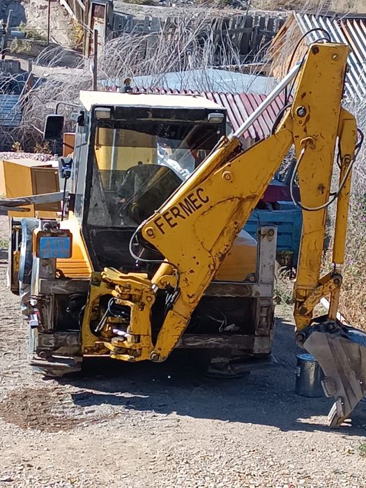 Экскаватор погрузчик 3в1 Фермег английский