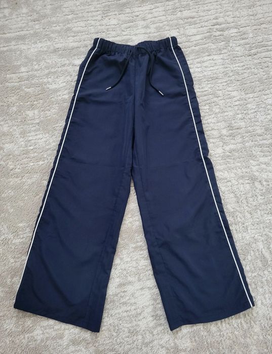 Pantaloni bleumarin cu dungi laterale