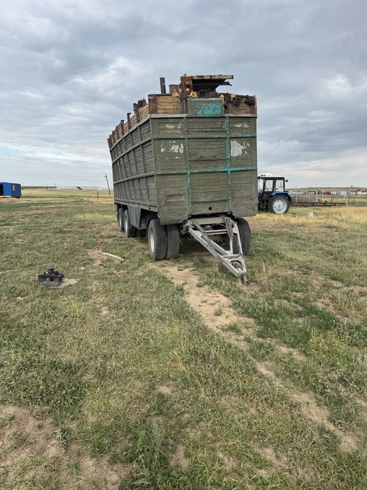 Прицеп бортовой трехмостовой