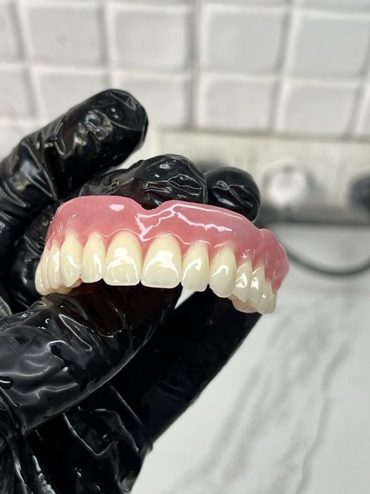 Зубной техник