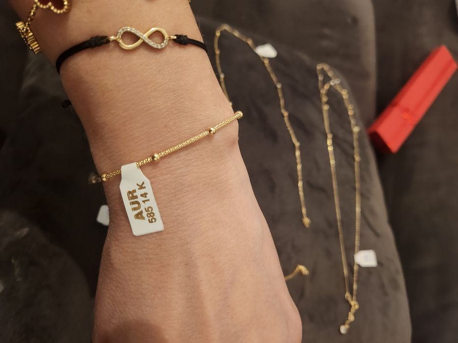 Vand lantisor si bratara subtire aur 14karate pret 520/gr