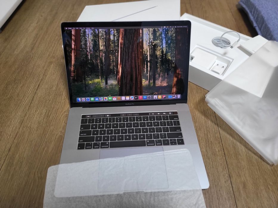 Macbook pro karobka hujati bilan