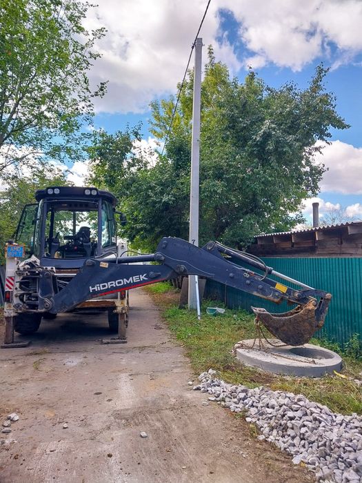 Услуги экскаватора погрузчика hidromek