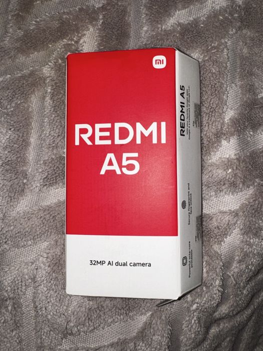 Redmi A5 нов.