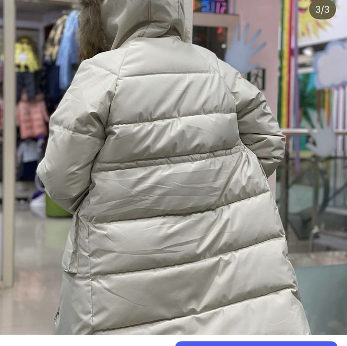 Удлиненный зимний  пуховик на девушку