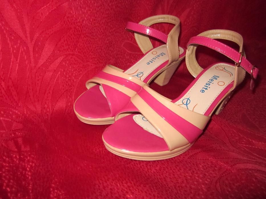 Продам новые босоножки