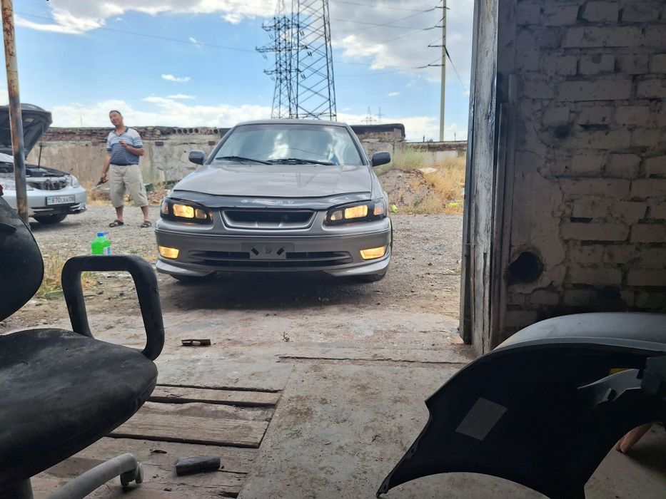 Решетка камри 20,25