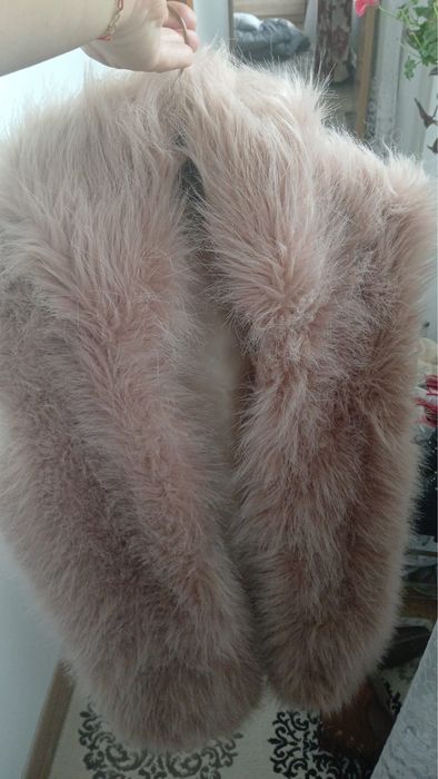 Vesta blana artificiala