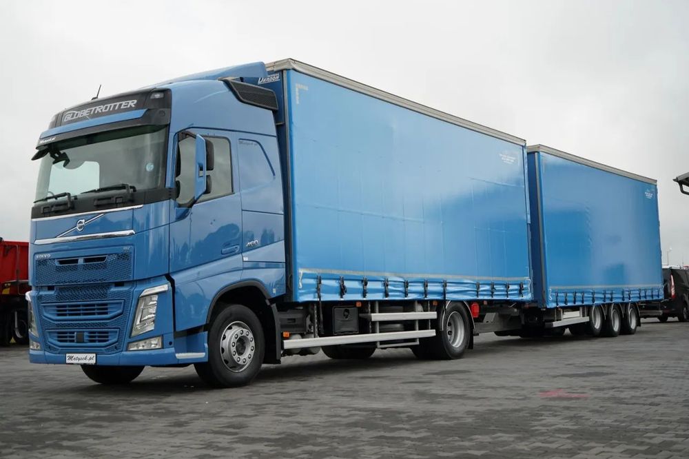 Volvo FH 460 / ANSAMBLU TANDEM / 120 m³ / ÎNCĂRCARE PRIN TRECERE (DRIVE-THROUGH) / PRELATĂ CULISANTĂ / 7,3 m + 8,2 m / CLIMATIZARE STAȚIONARĂ / I-SHIFT / PODEA REZISTENTĂ (HEAVY-DUTY) /