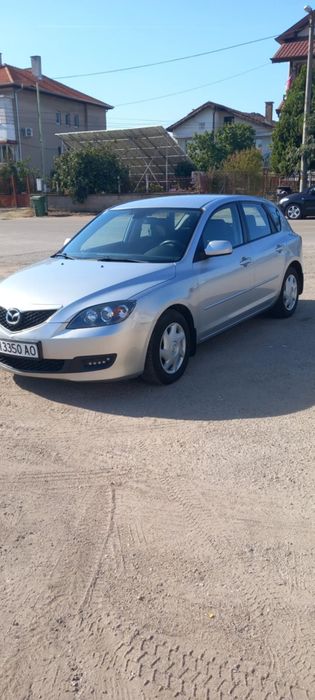 Автомобил Мазда 3