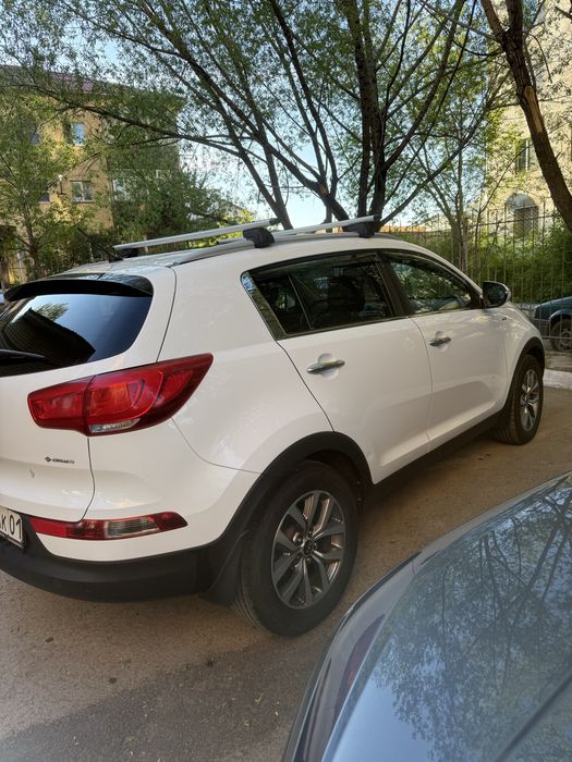 Kia sportage 2014 год