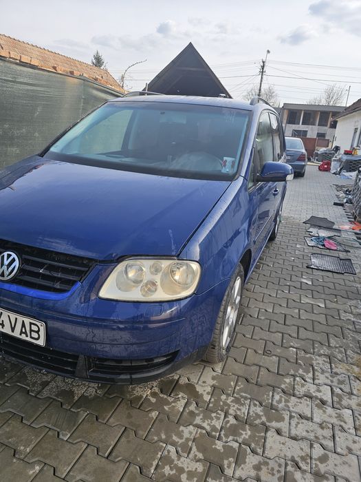 Vând Urgent Touran , citește anuntul
