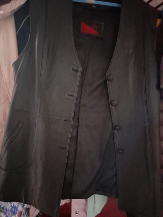 Жилет. 7 тыщ. Тенге.