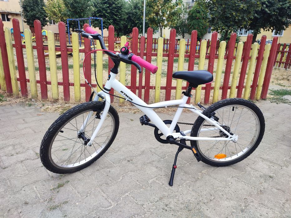 Bicicleta aproape noua