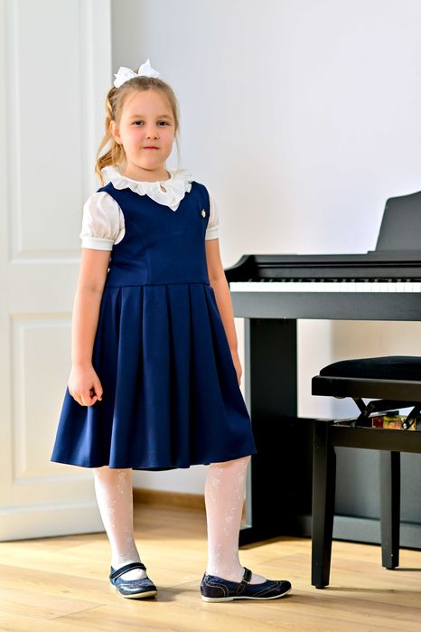 Uniforme scolare: bluza de scoala crem cu guler din bumbac tricot