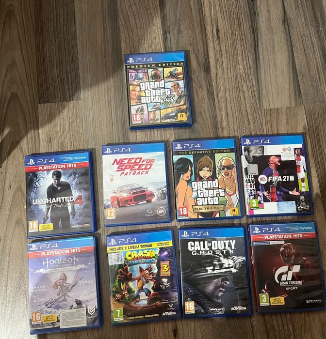 Vand ps4 1TB 2 manete 9 jocuri