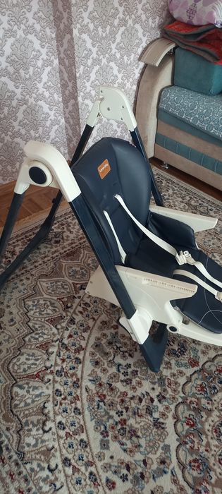 Детский стульчик на колесах.