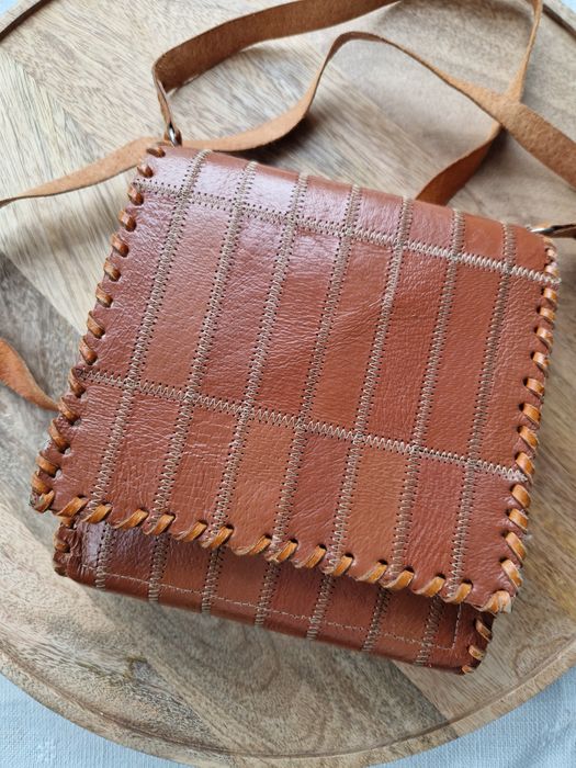 Кожени чанти и портмоне нови и използвани