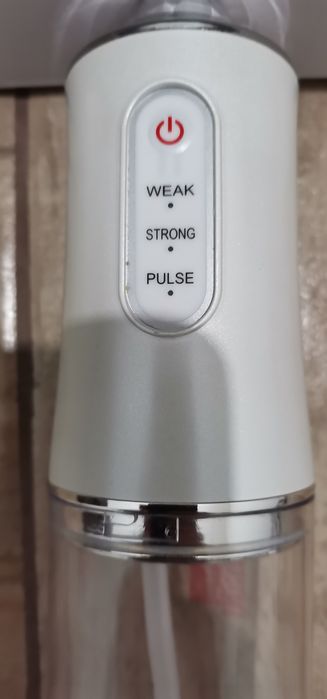 Irigator oral portabil (duș bucal).