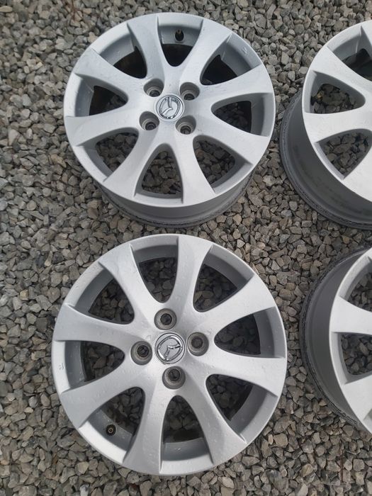 4x100..15.цола.6j ET45..оргинални Mazda