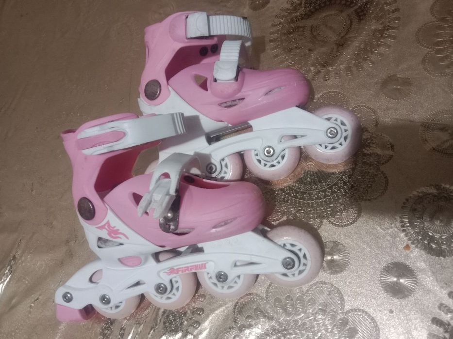 Роликовые коньки