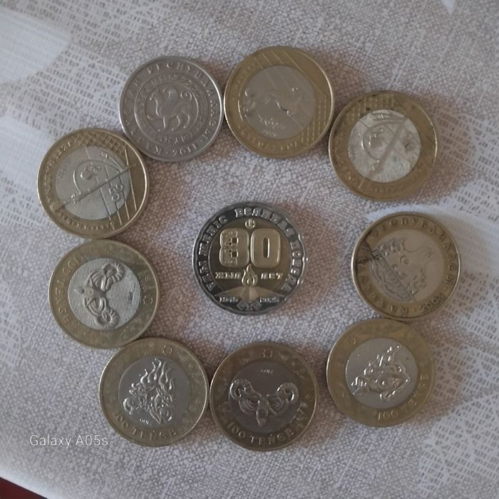 Монеталар сатылады 100 тенгелiктер