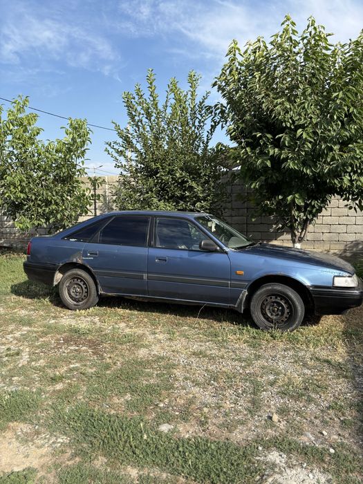Мазда 626 синий.