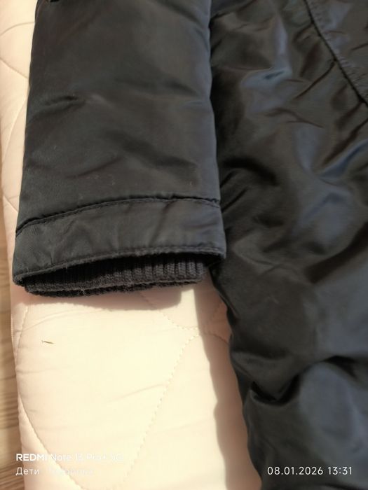 Продавам тъмно синьо,зимно яке KHUJO.