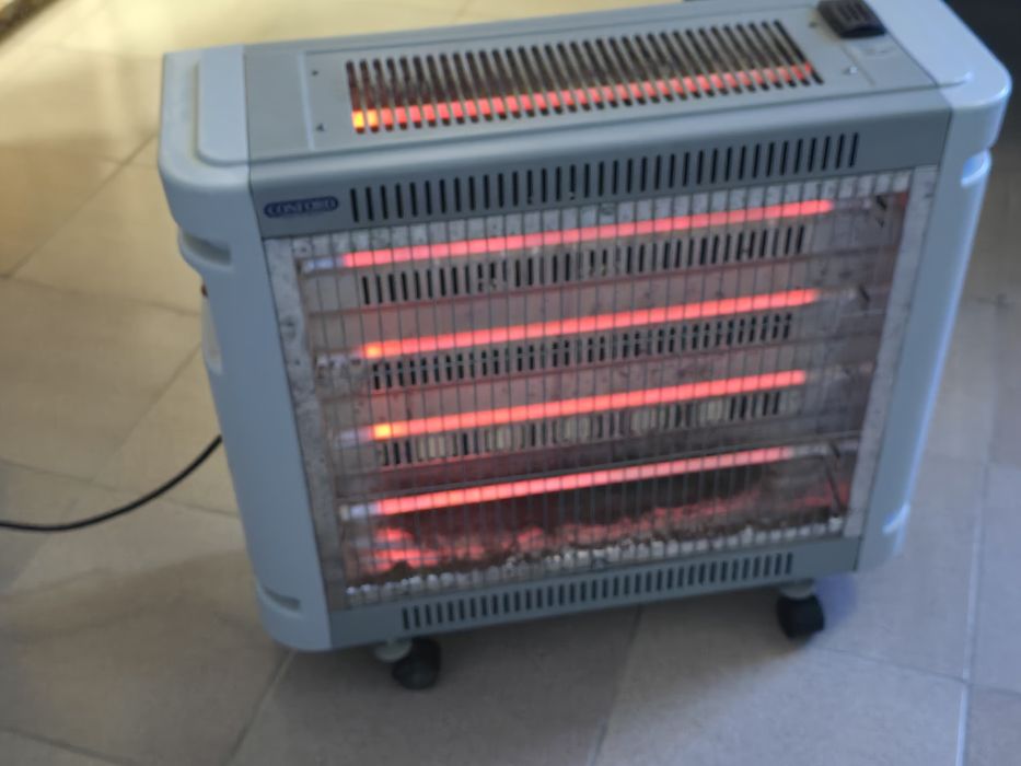 Печка обогреватель сотилади. Холати яхши