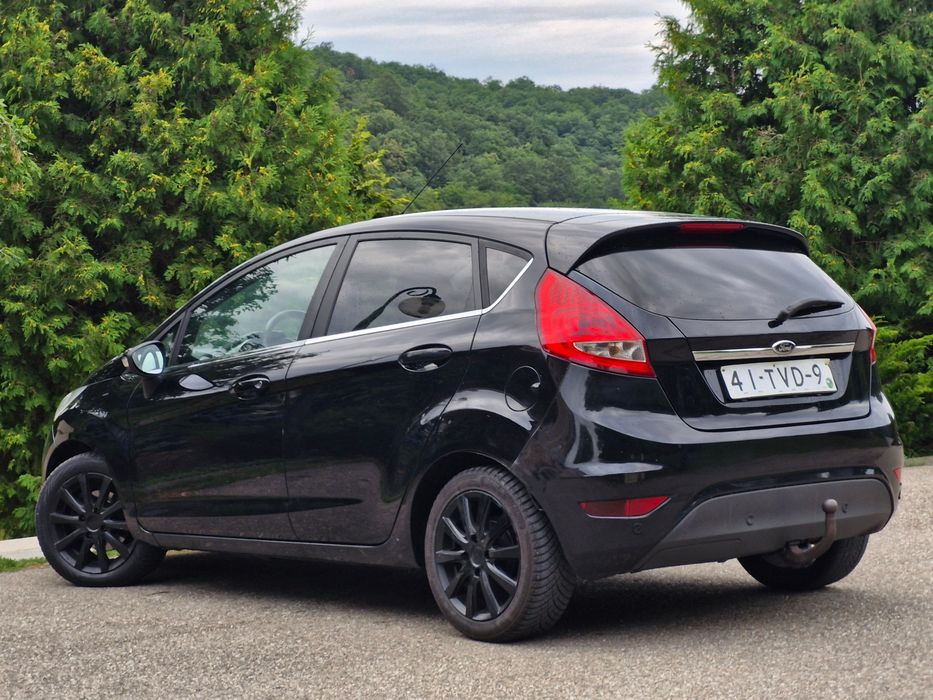 Ford Fiesta 2012 1.6 TDCi 95cp TITANIUM Încălzire in scaune Sony numere valabile xenon Pilot automat