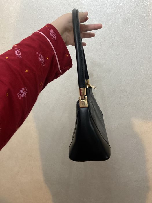 Мини сумка с круглой ручкой