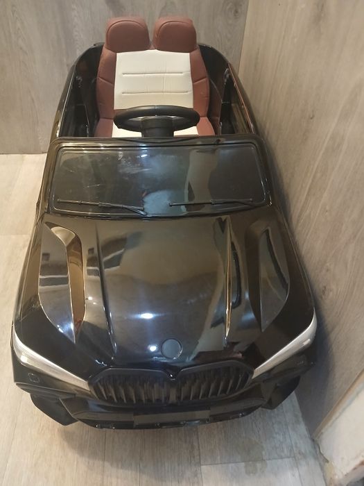 Электромобиль BMW черный