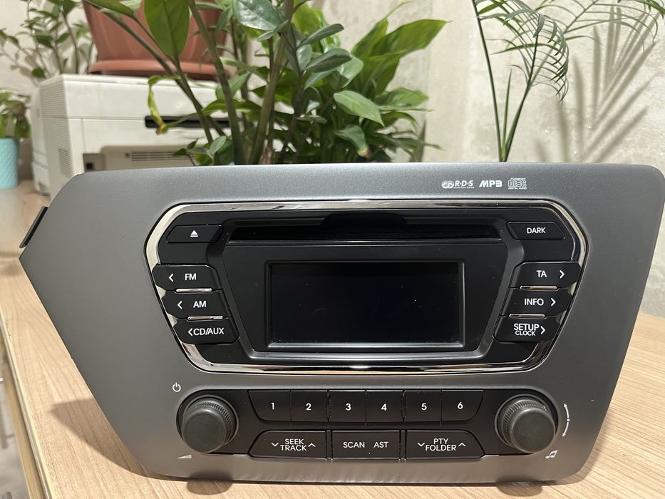 магнитола на кио рио 2014