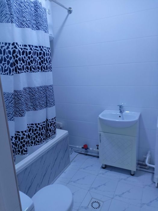 Двухкомнатная квартира 49,8 м.кв на первом этаже .