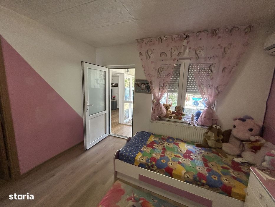 Vand casa din caramida, st.494 mp, sc.131 mp, cu 4 cam.2 bai, moderna