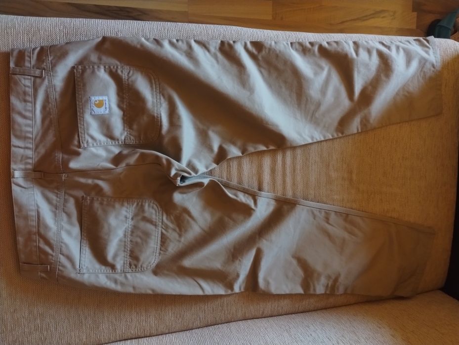 Pantaloni si fesuri Carhartt