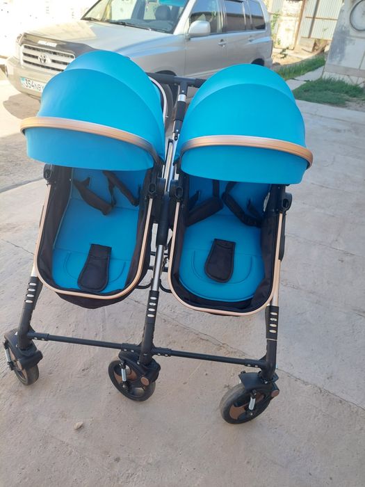 Коляска для близнецов