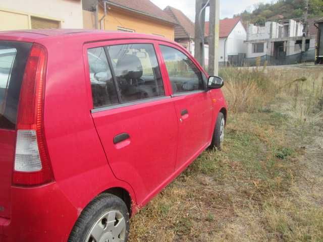 Daihatsu Cuore 2005,benzină